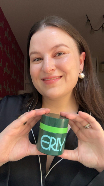 Selfie of Allure features director Dianna Singh holding the Erly Night Moisturizer