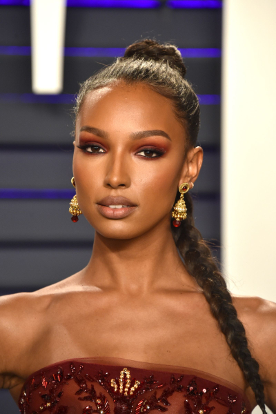 Jasmine Tookes wearing burgundy eyeshadow