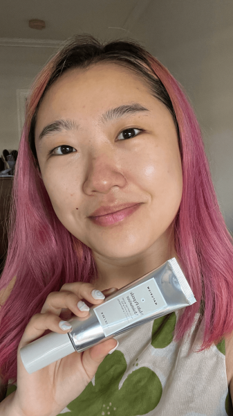 Image may contain Adult Person Face Head Hair and Pink Hair